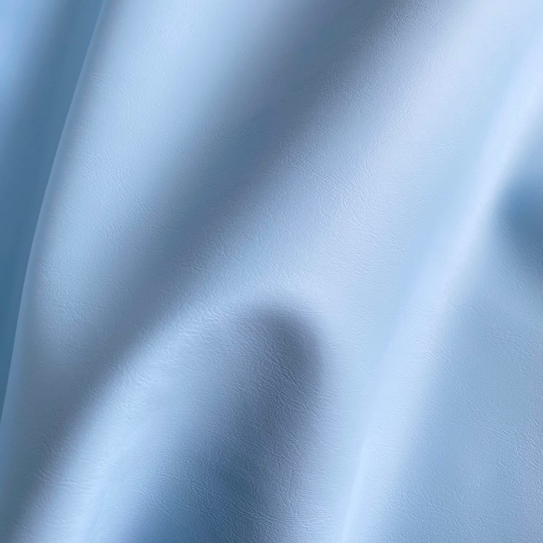 Eden Upholstery Vinyl: Azur Blue. Light Blue furniture vinyl