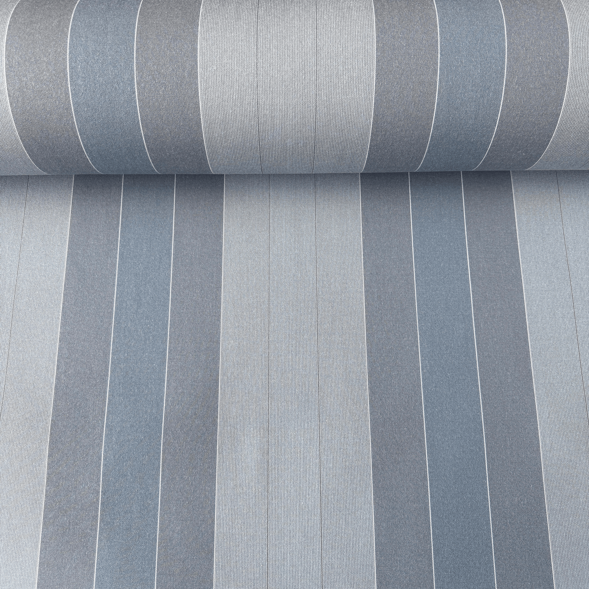 A close-up of striped canvas fabric with vertical bands in light gray, medium gray, and muted blue-gray, showing a subtle woven texture.