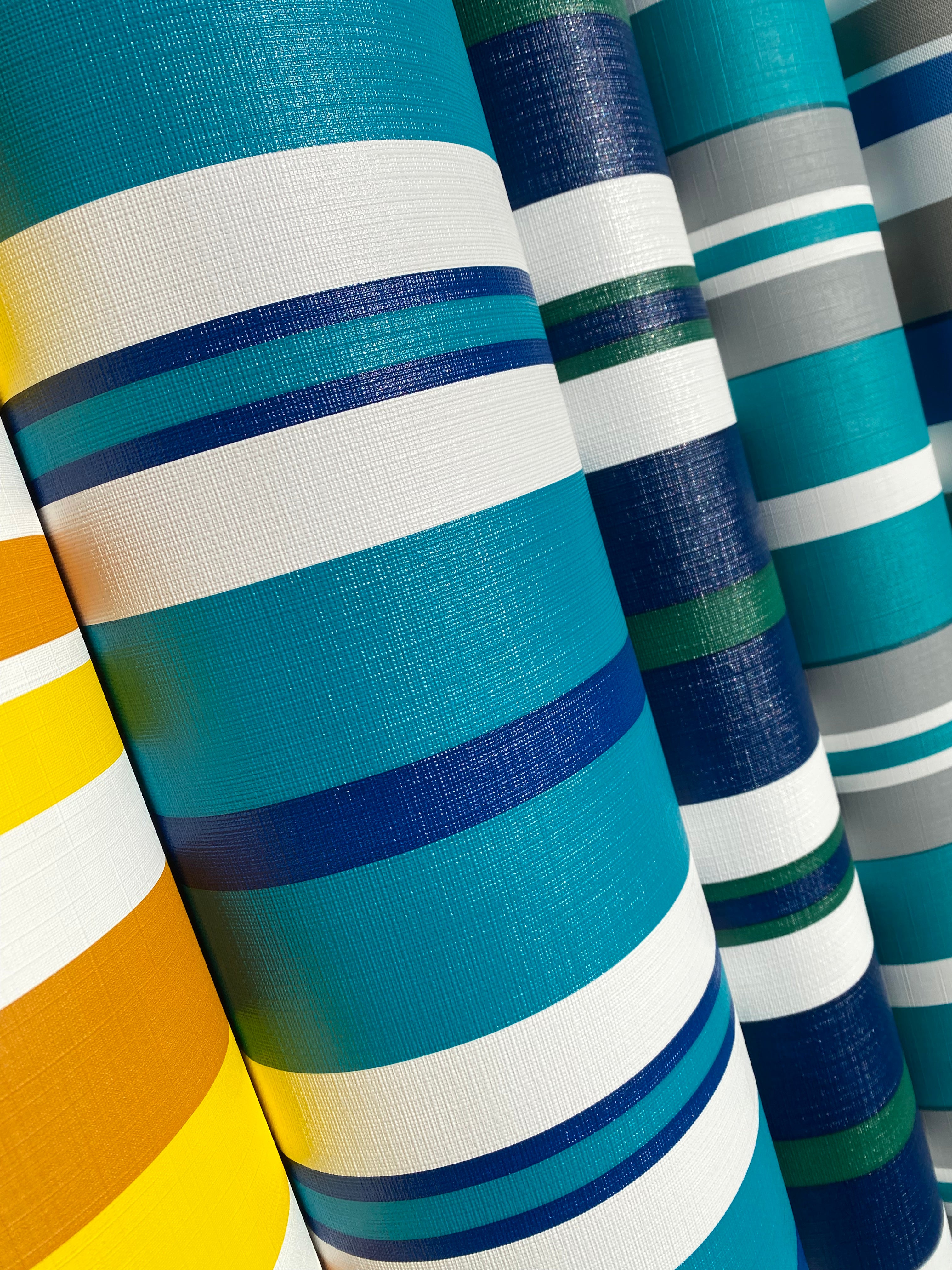 Teal, Blue White Stripe by Brella is a plastic vinyl designed for an array of applications.