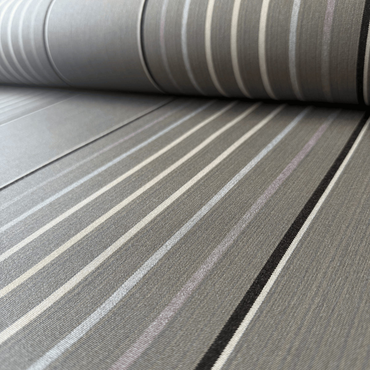 Sunbrella Motive Dusk 4894 is 117cm wide and is used for upholstery, awnings and marine applications